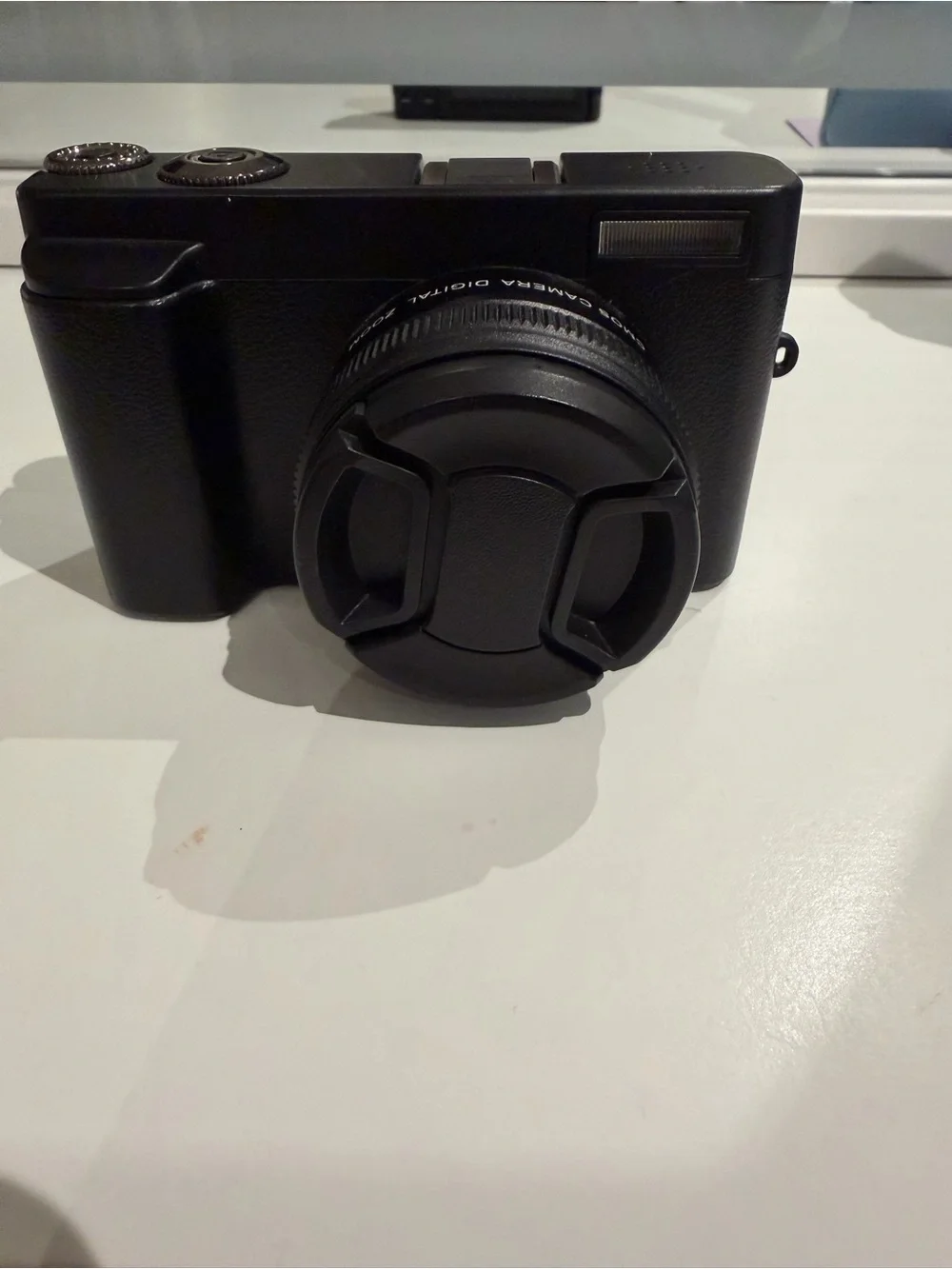 Compact Black Digital Camera with Flip Screen